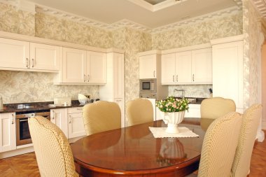 Interior of a dinning room and a kitchen clipart