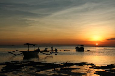 Sunset in Indonesia Bali Kuta clipart