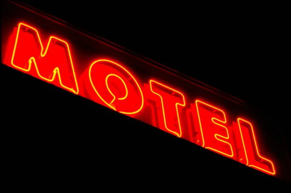 Cartel del motel iluminado por la noche — Foto de Stock