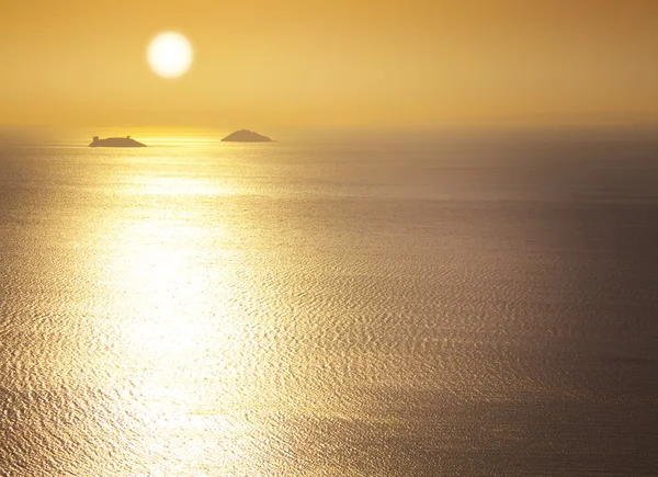 stock image Sea / sunrise / silhouettes of the islands / space for your text