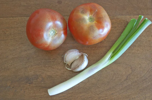 Tomates, cebolas e alho closeup — Fotografia de Stock
