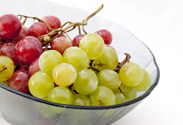 Source of glass with grapes — Stock Photo, Image