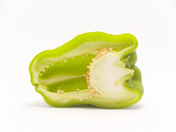 Green pepper cut in half — Stock Photo, Image