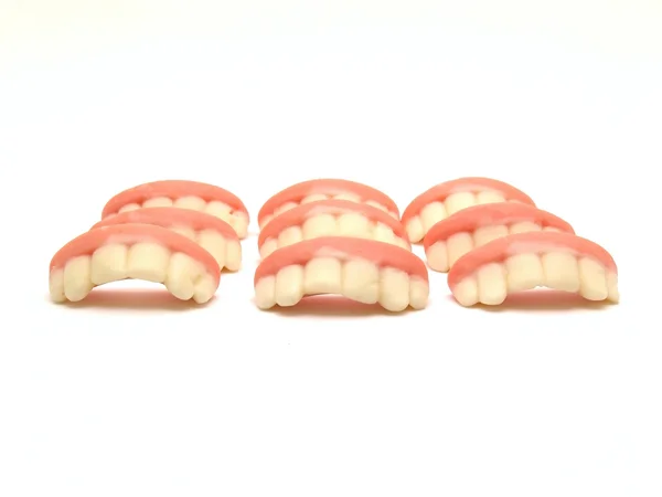 Зубы в форме конфет — стоковое фото