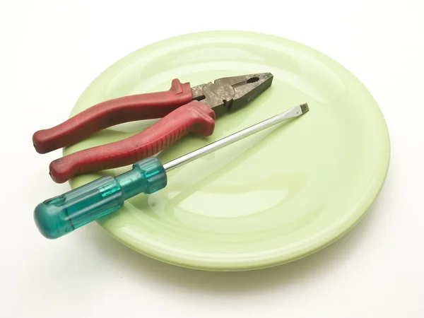 Dish with tools — Stock Photo, Image