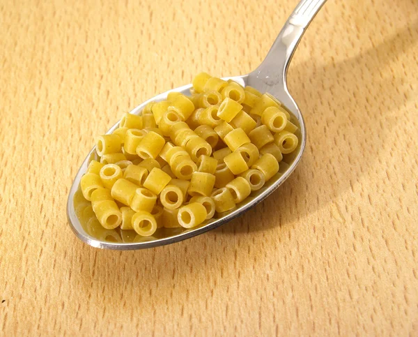 Lžíce a nudlová polévka — Stock fotografie