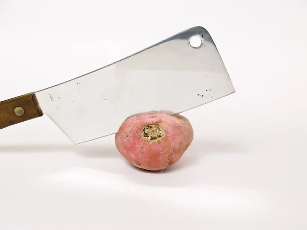 Süßkartoffeln und Messer — Stockfoto