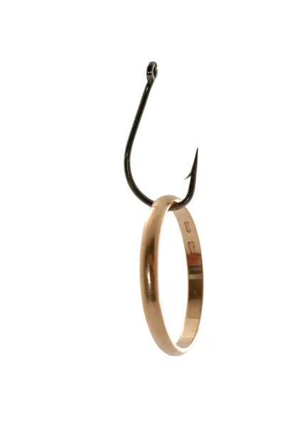 Gold ring on fishhook — Stock Photo, Image