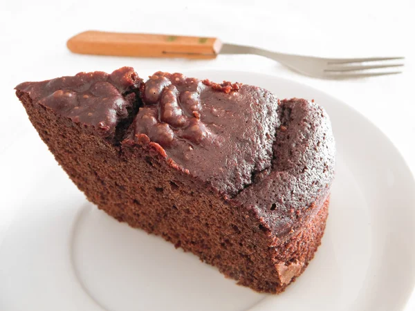 Schokoladenkuchenstück zum Frühstück. — Stockfoto