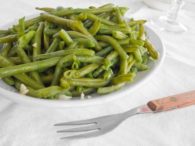 Green Beans Salad on white dish. clipart