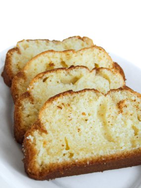 Plumcake on white dish. clipart