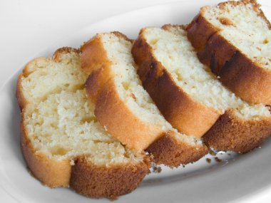 Plumcake on white dish. clipart