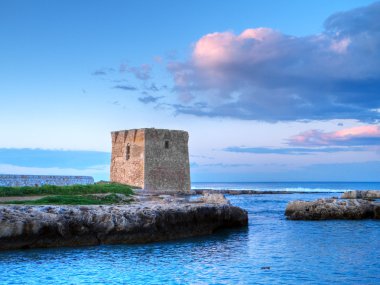 Abandoned tower at sunset. clipart