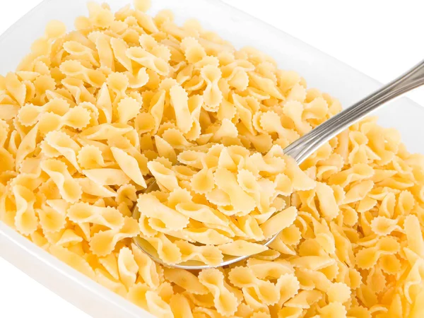 Short-cut pasta with spoon. — Stock Photo, Image