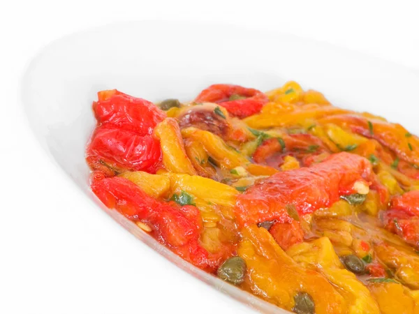 Roasted Bell Pepper Salad on white dish. — Stock Photo, Image