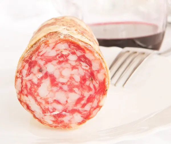 stock image Salami with fork.