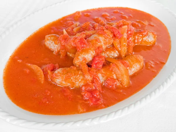 Salsicce in salsa di pomodoro . — Foto Stock