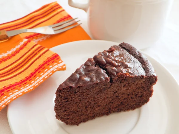 Rebanada de pastel de chocolate en el desayuno . —  Fotos de Stock
