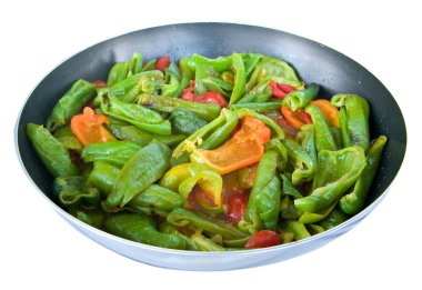 Peppers cooked in a saucepan. clipart