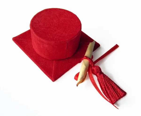 Červená stupeň klobouk. — Stock fotografie