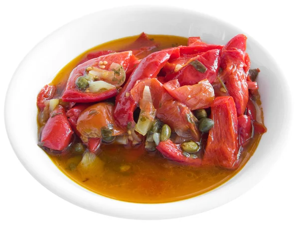 Stewed peppers on white dish. — Stock Fotó