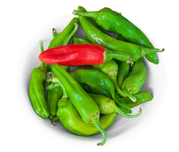Chili peppers on white dish. — Stock Photo, Image
