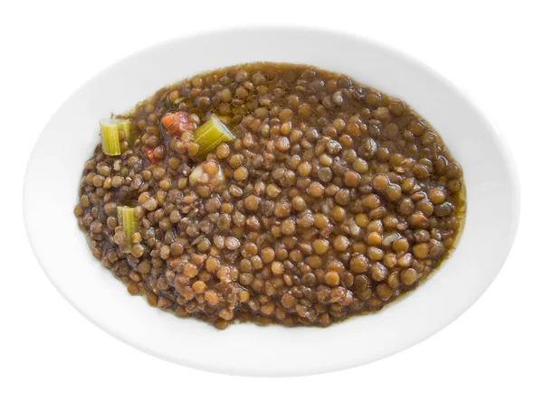 Minestra di lenticchie su piatto bianco . — Foto Stock
