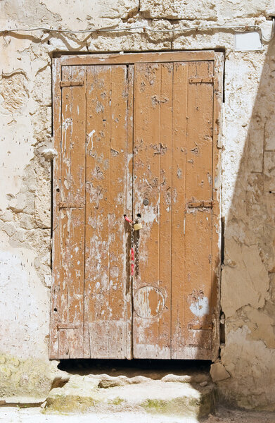 Derelict wooden door.