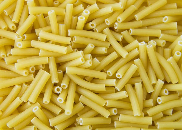 Rigatoni pasta background. — Stock Photo, Image