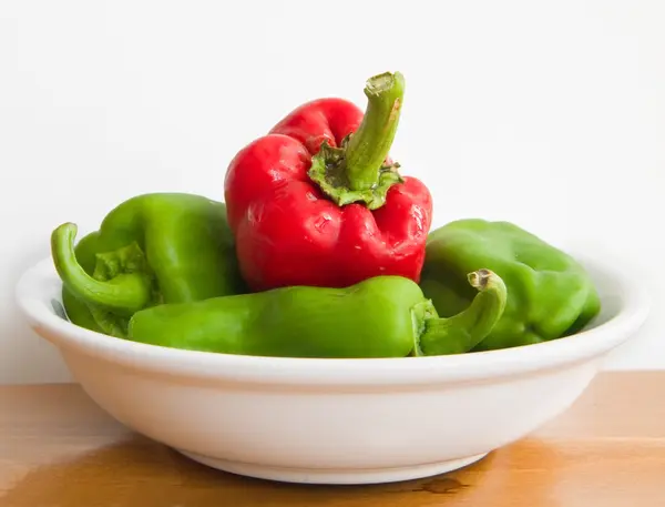 Bell pepper on white dish. — Stock Photo, Image