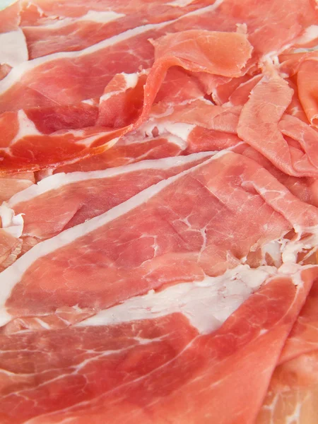 Closeup of raw ham sliced. — Stock Photo, Image