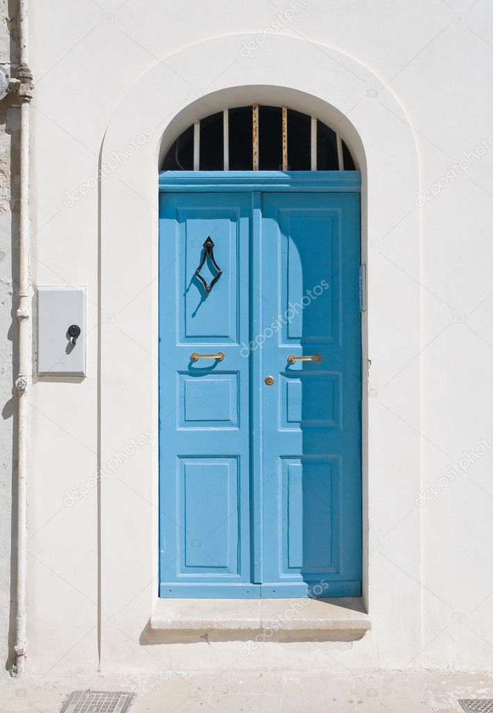 Wooden blue door.