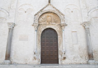 Wooden Portal of Basilica St. Nicholas. Bari. Apulia. clipart