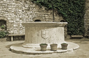 Puteale. Circular well. Corciano. Umbria. clipart