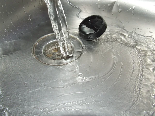Slösa vatten — Stockfoto