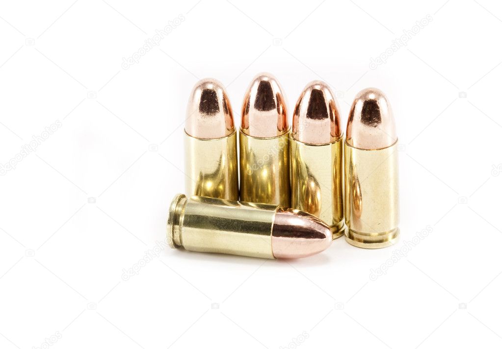 Five 9mm bullets isolated on white