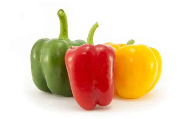Rode, groene en gele paprika 's — Stockfoto