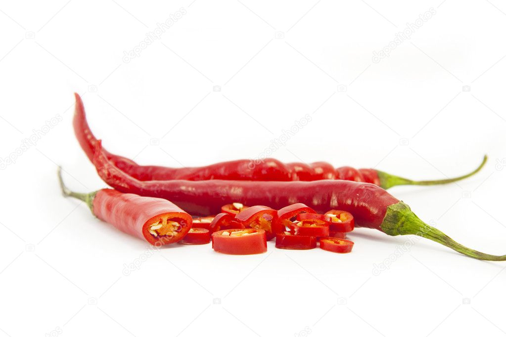 Sliced red chillies on white