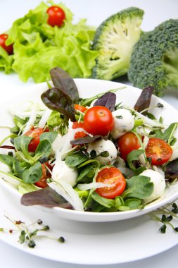 Fresh salad with mozzarella and tomatoes clipart