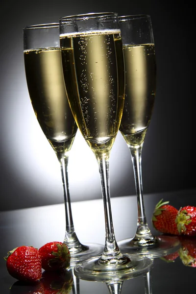 stock image Glass of champagne with strawberry