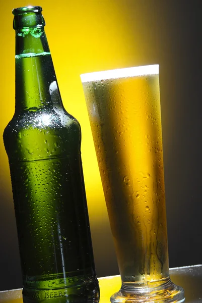 Glass and bottle of beer — Stock Photo, Image