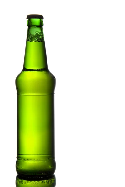 Green beer bottle isolated on white Royalty Free Stock Photos