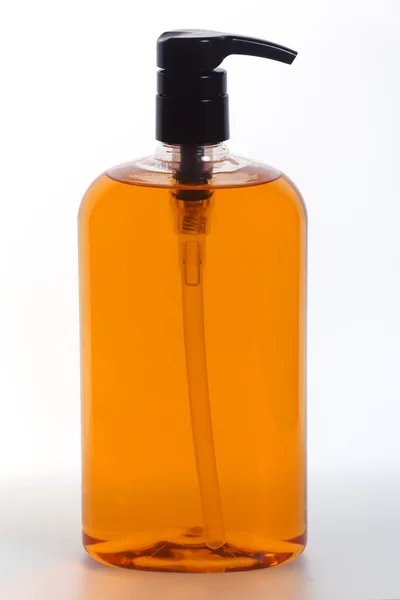 stock image Generic Pump Bottle with Orange Liquid