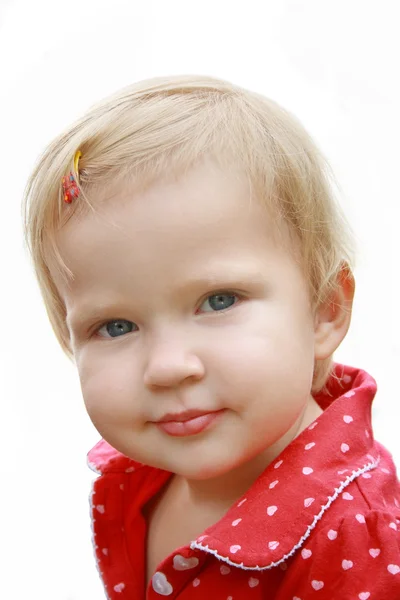 Roztomilá holčička v červených šatech zblízka — Stock fotografie