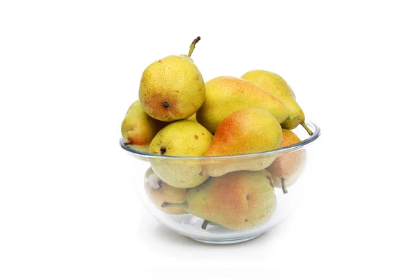 Yellow pears on glass dish — Stock Photo, Image