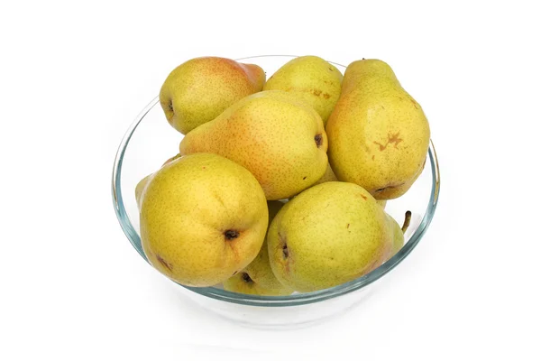 Yellow pears on glass dish — Stock Photo, Image