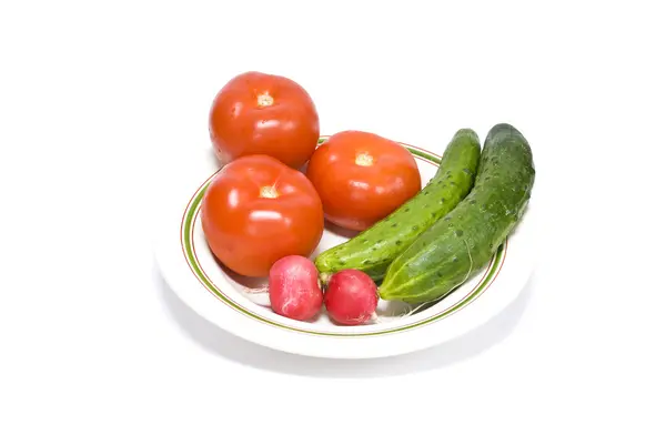 Tomatoes cucumbers and radishes — Stock Photo, Image