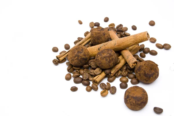Truffles coffee beans and cinnamon — Stock Photo, Image