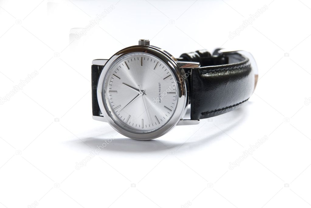 Wristwatch on a white