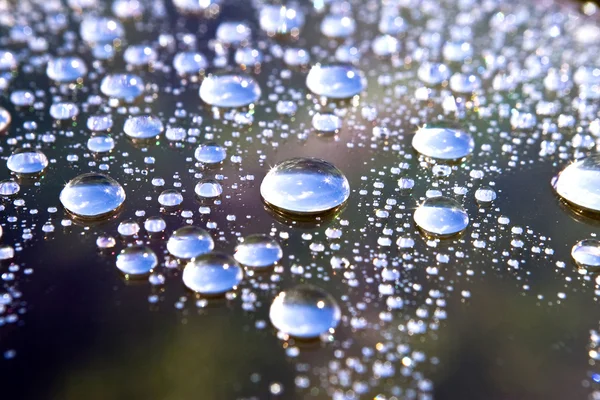 Water drops and sky Royalty Free Stock Images